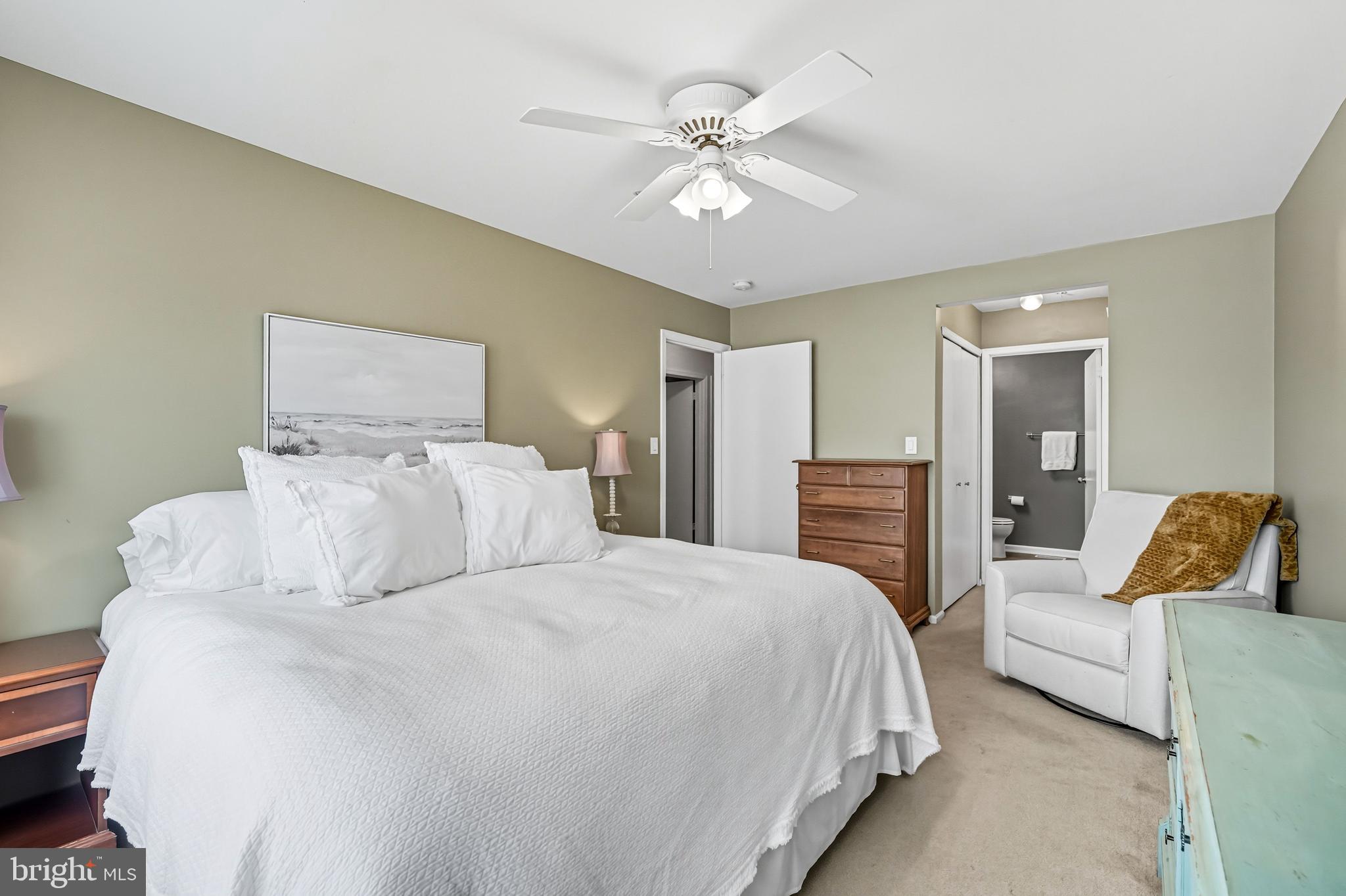 1603 Wharton Road Mount Laurel, NJ 08054 - Photo 29 of 39 a bedroom with a large bed and ceiling fan
