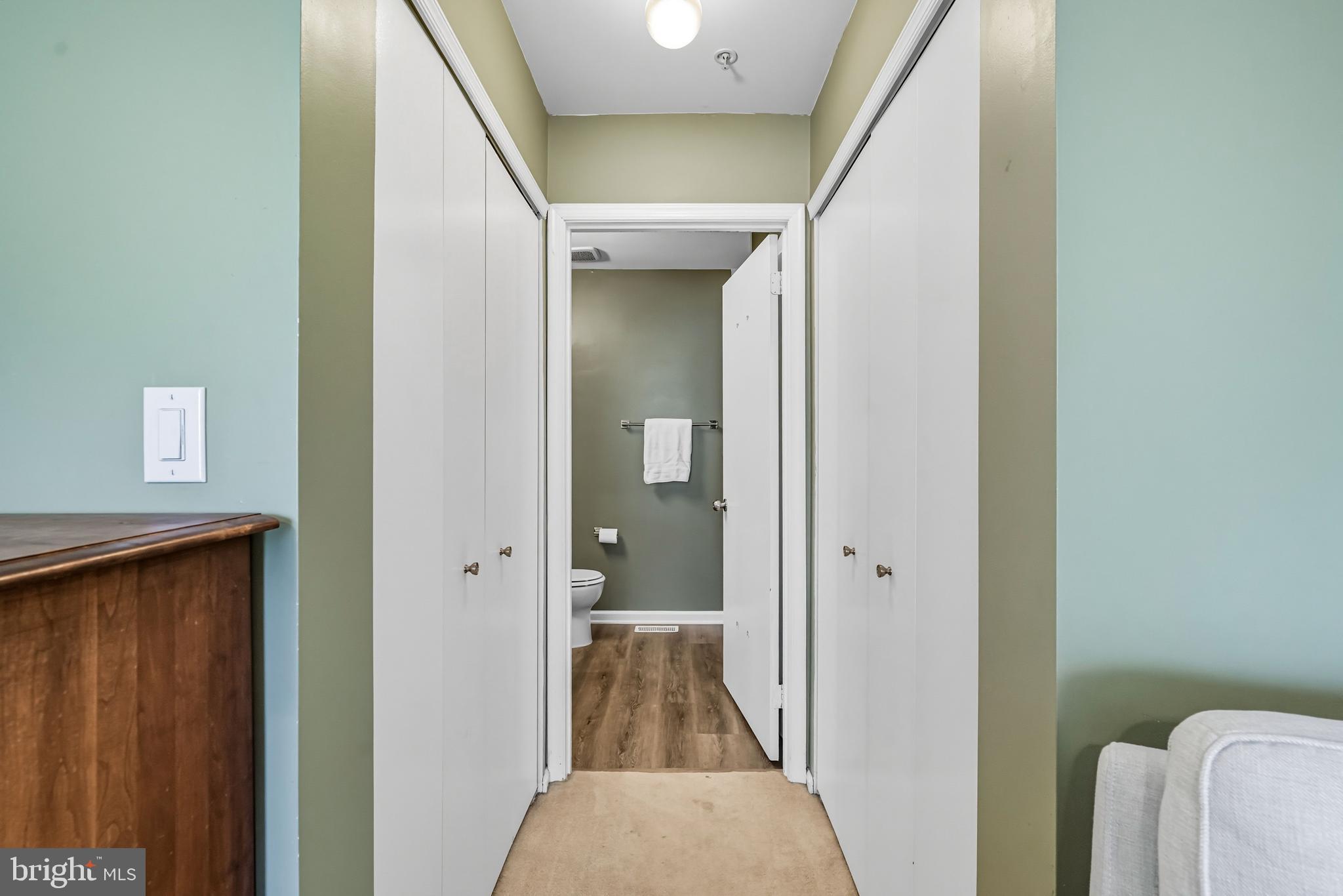 1603 Wharton Road Mount Laurel, NJ 08054 - Photo 30 of 39 a view of a hallway with wooden floor and a bathroom