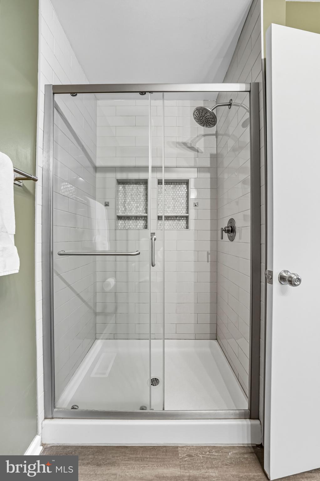 1603 Wharton Road Mount Laurel, NJ 08054 - Photo 32 of 39 a bathroom with a glass shower door