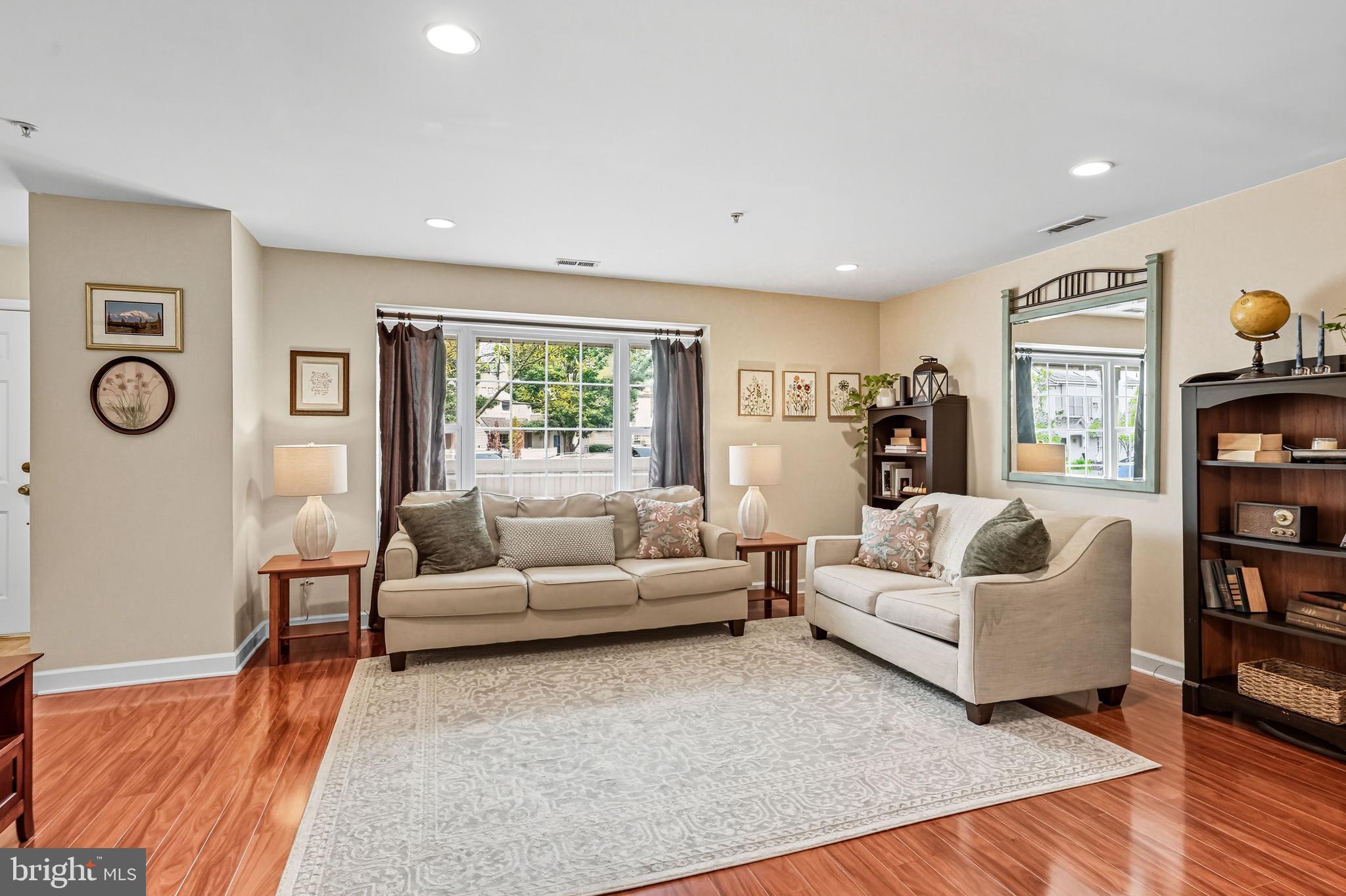 1603 Wharton Road Mount Laurel, NJ 08054 - Photo 7 of 39 a living room with furniture and a large window