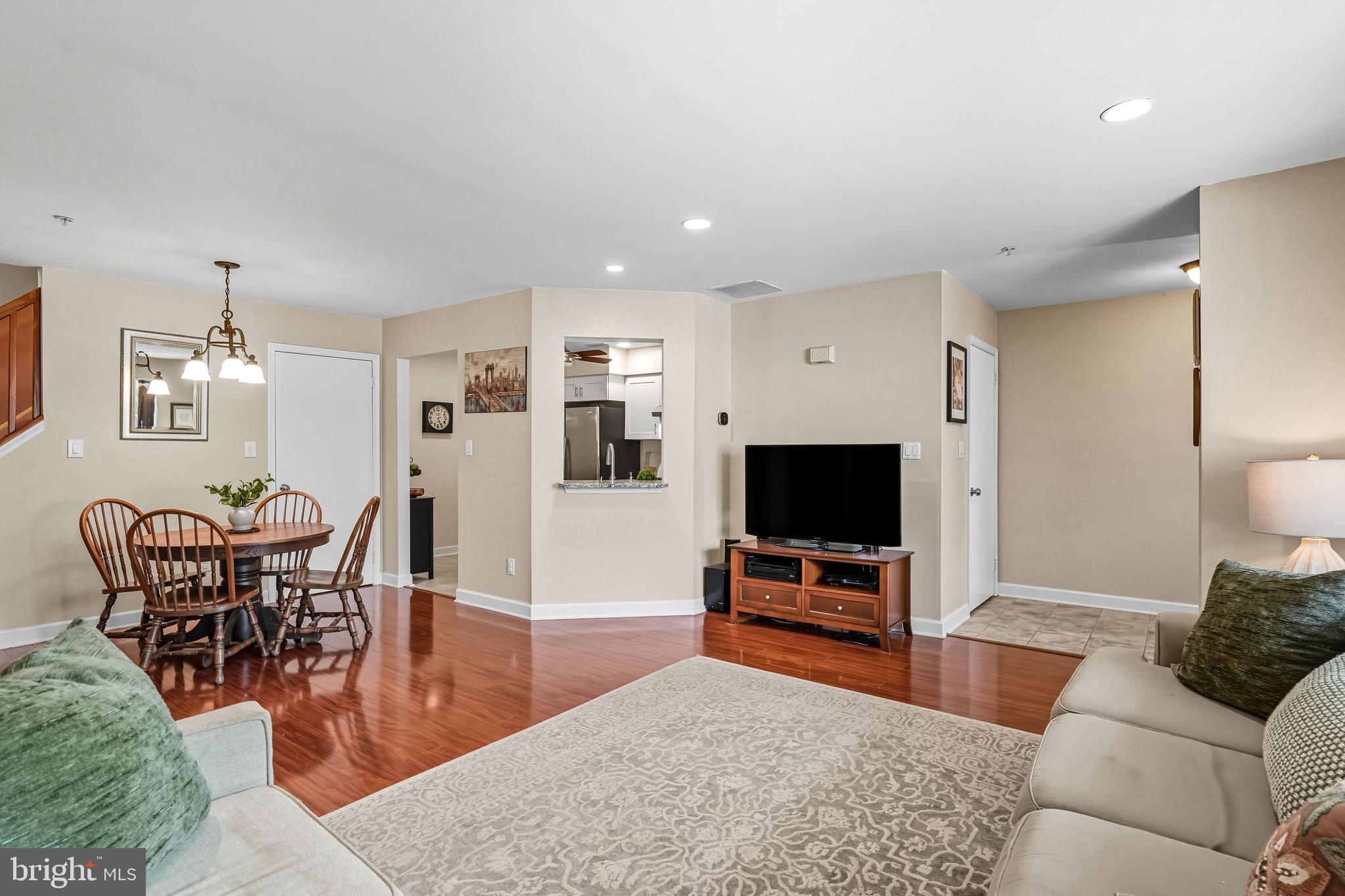 1603 Wharton Road Mount Laurel, NJ 08054 - Photo 9 of 39 a living room with furniture and a flat screen tv
