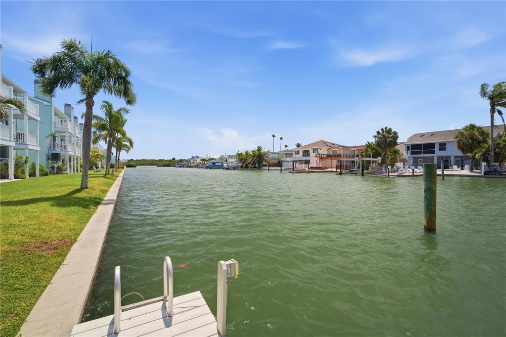 643 Garland Circle Indian Rocks Beach, FL 33785 - Photo 55 of 81 a view of a lake with houses in the back