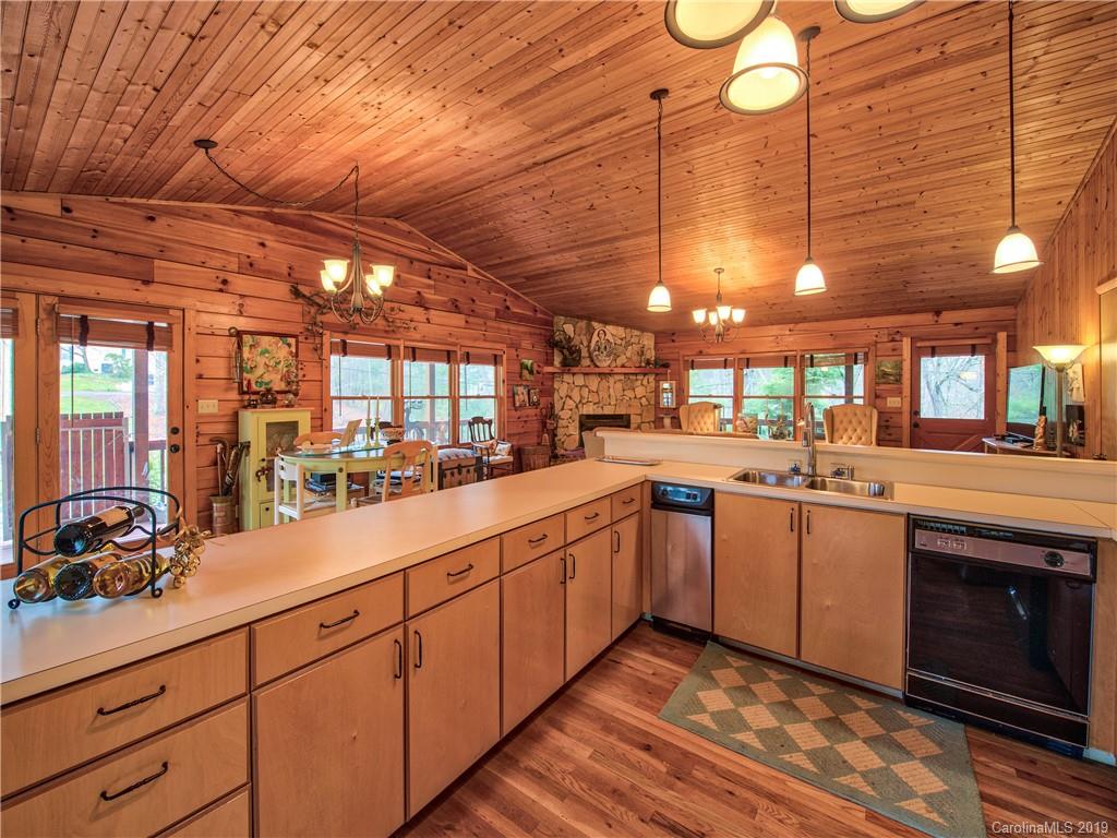 24 Thistle Ridge Clyde, NC 28721 - Photo 12 of 18 a large kitchen with cabinets and a stove