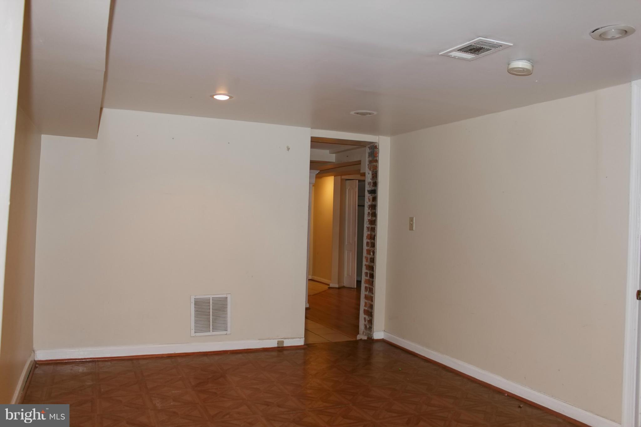 642 8th Street Northeast Washington, DC 20002 - Photo 19 of 29 a view of an empty room with wooden floor and closet
