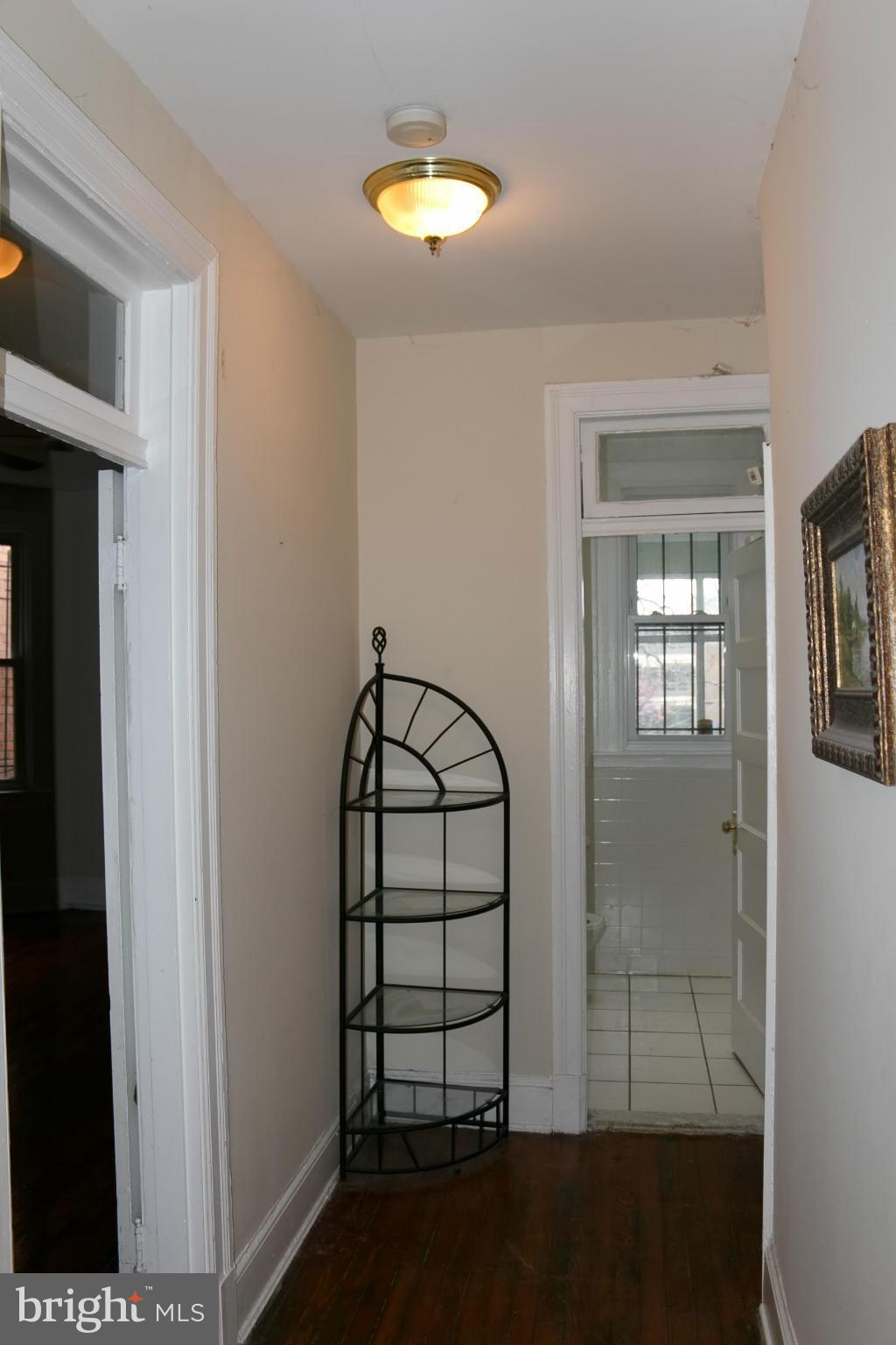 642 8th Street Northeast Washington, DC 20002 - Photo 22 of 29 a view of staircase with white walls and window