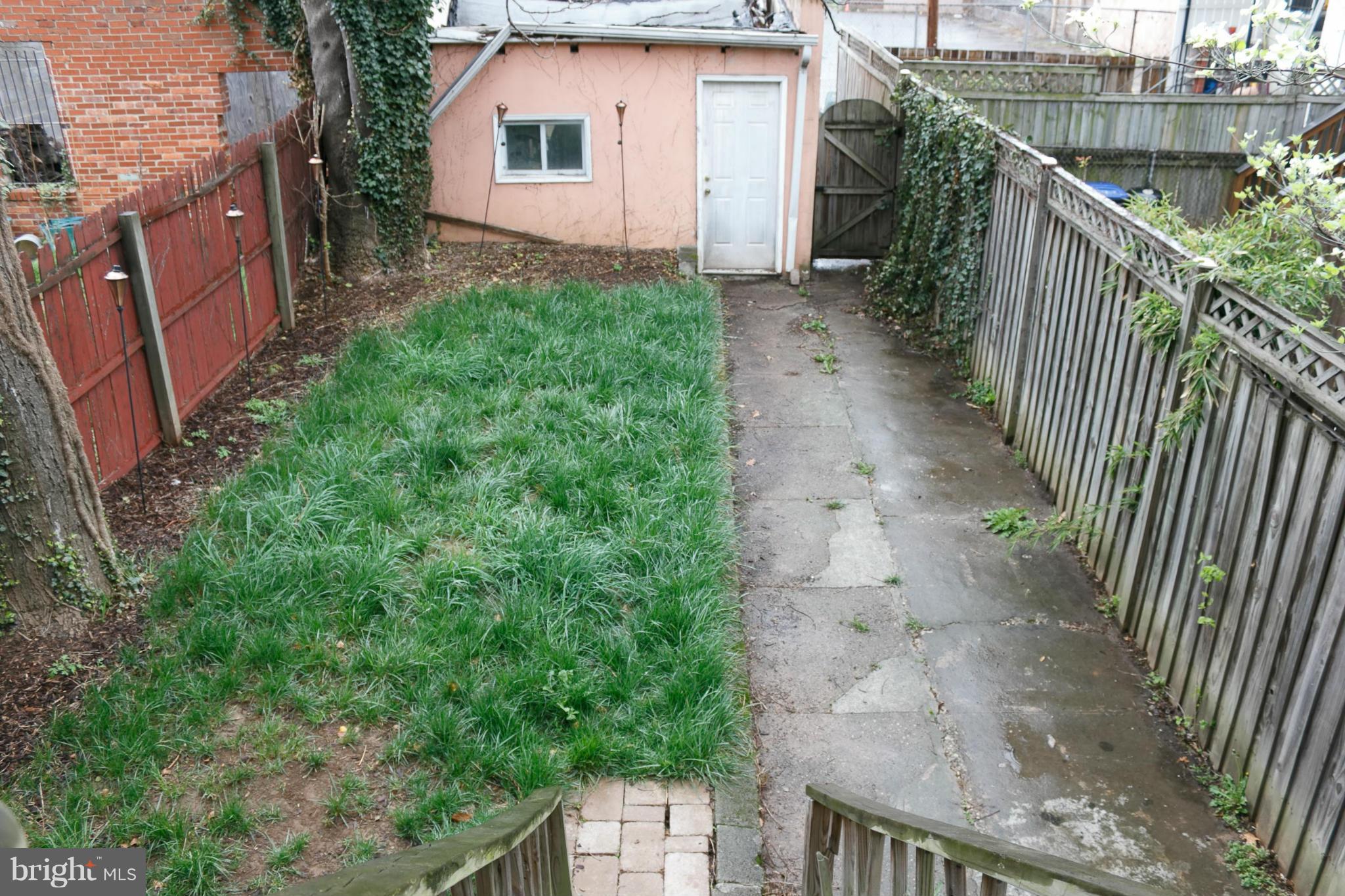 642 8th Street Northeast Washington, DC 20002 - Photo 25 of 29 a backyard of a house with lots of green space