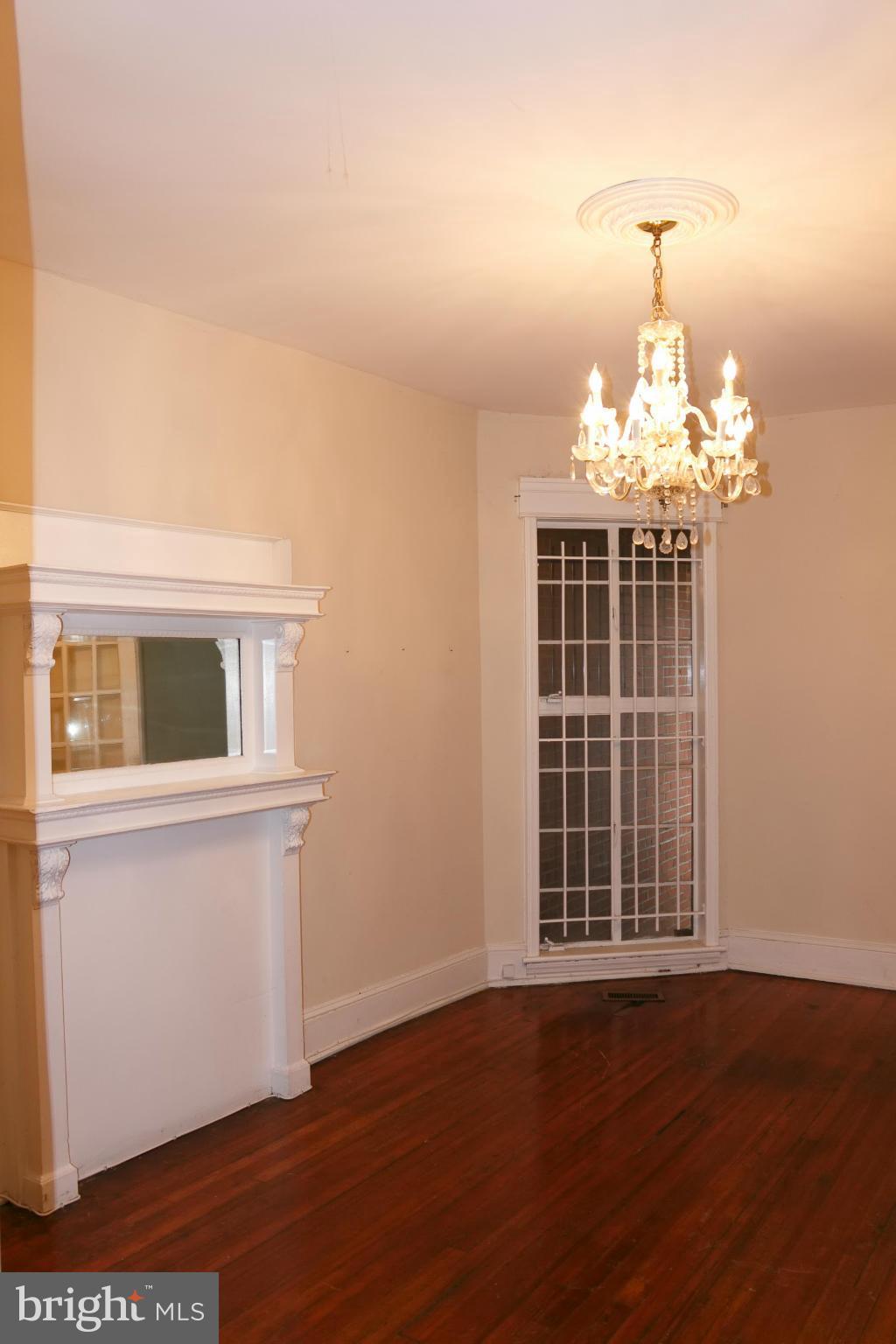 642 8th Street Northeast Washington, DC 20002 - Photo 6 of 29 a view of a livingroom with furniture wooden floor and chandelier