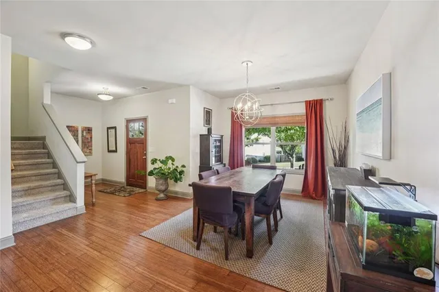 a living room with fireplace furniture and a flat screen tv