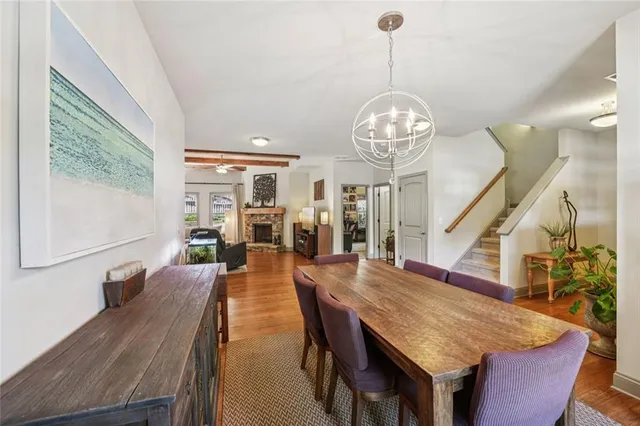 a living room with lots of furniture and a rug