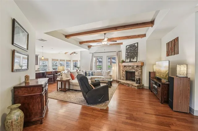 a kitchen with stainless steel appliances granite countertop a sink and stove