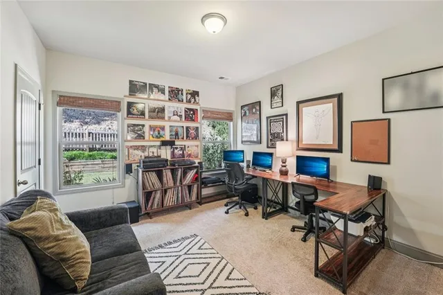 a bedroom with a bed and dresser