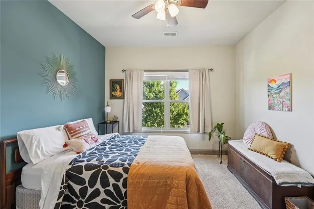 a spacious bathroom with a double vanity sink mirror double shower and a