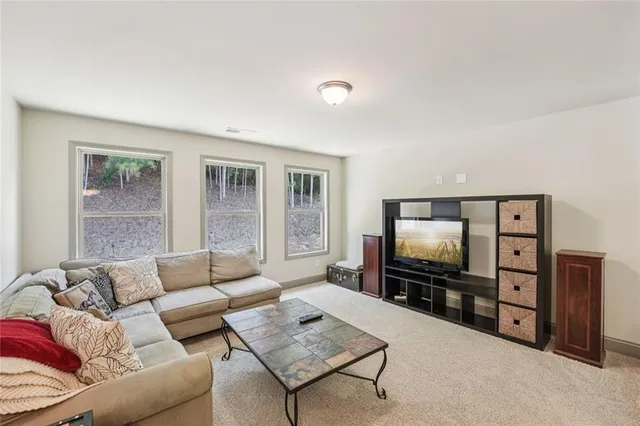 aerial view of a house with a garden