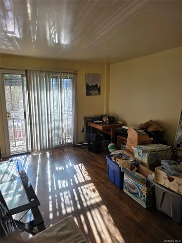 a bed room with furniture and a window