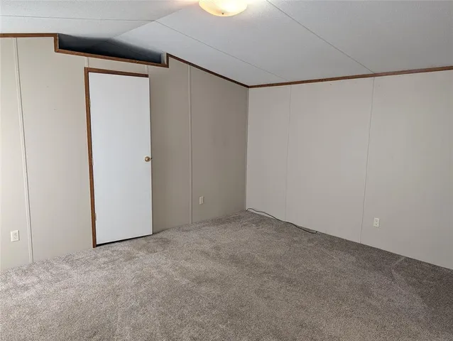 a bathroom with a toilet and a sink