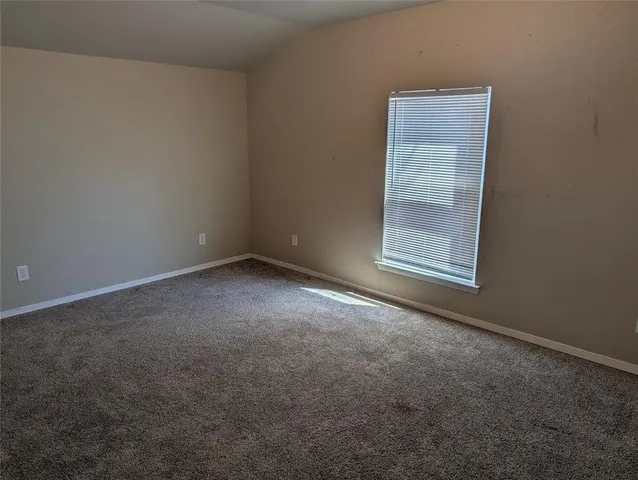 a view of a room with rack on the wall