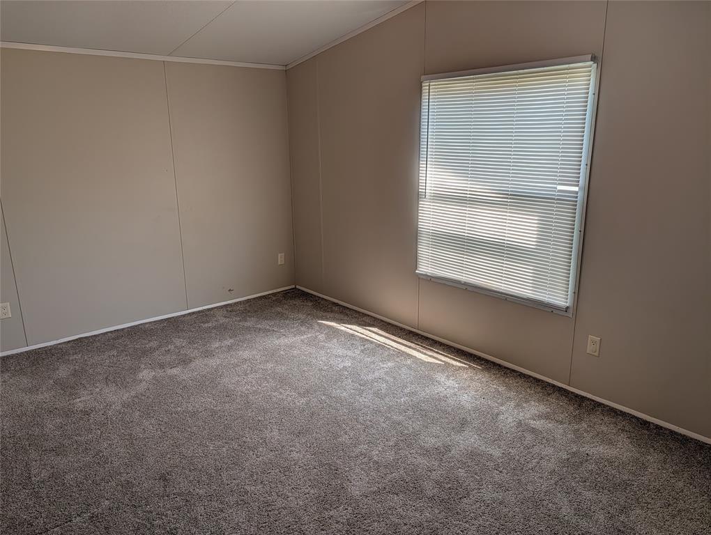 11478 Gordon Lane Mabank, TX 75147 - Photo 23 of 27 an empty room with a window