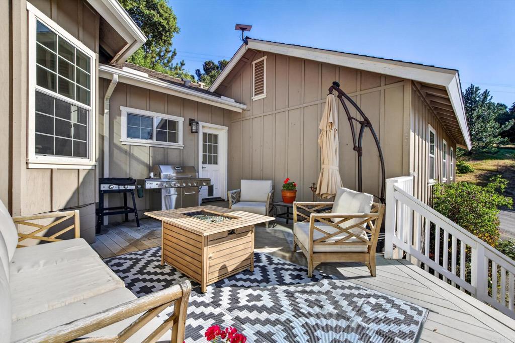 25350 Mesa Grande Road Santa Ysabel, CA 92070 - Photo 21 of 55 a view of a dinning table and chairs in patio of the house
