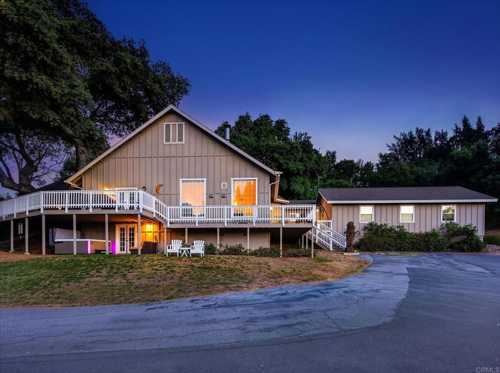25350 Mesa Grande Road Santa Ysabel, CA 92070 - Photo 37 of 55 a front view of a house with a yard and garage