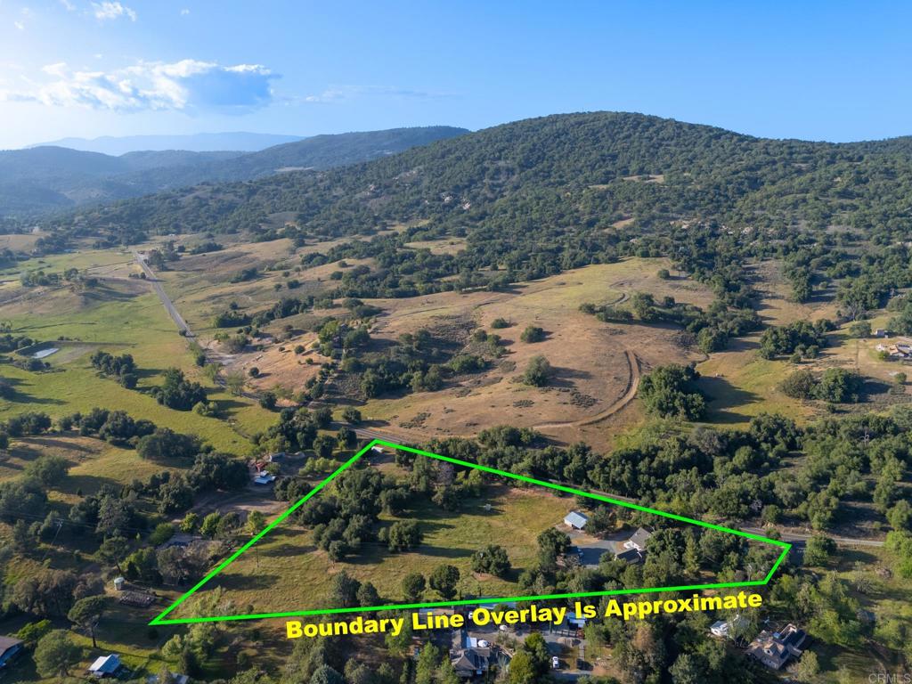 25350 Mesa Grande Road Santa Ysabel, CA 92070 - Photo 54 of 55 an aerial view of mountain with residential house and green space