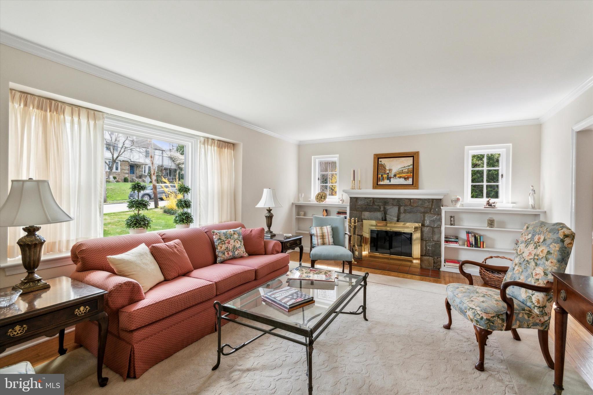56 Croton Road Wayne, PA 19087 - Photo 2 of 27 Large living room w/ stone wood burning fireplace