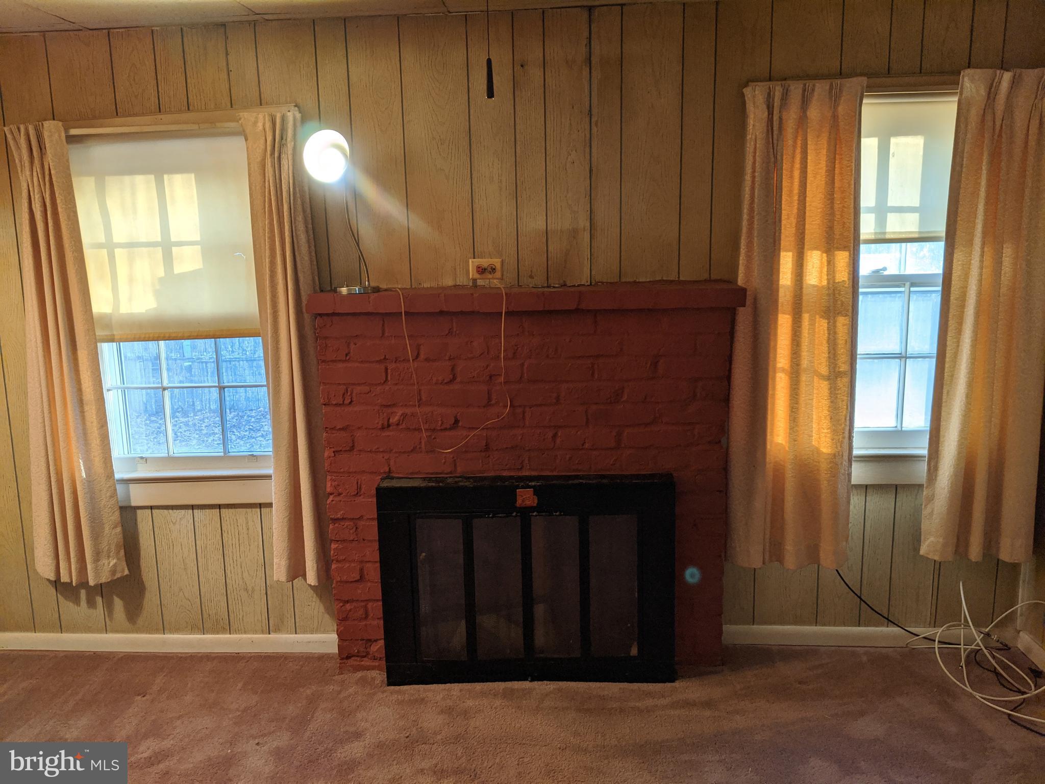 16768 Gridiron Road Cobb Island, MD 20625 - Photo 13 of 28 Brick fireplace
