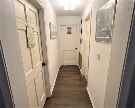 828 Rabbit Trail Road Five Points, TN 38457 - Photo 10 of 16 a view of a hallway with wooden floor and windows
