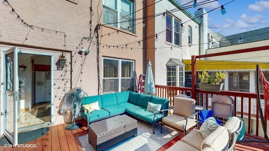 340 86th Street Brooklyn, NY 11209 - Photo 18 of 20 a view of a patio with couches table and chairs and potted plants