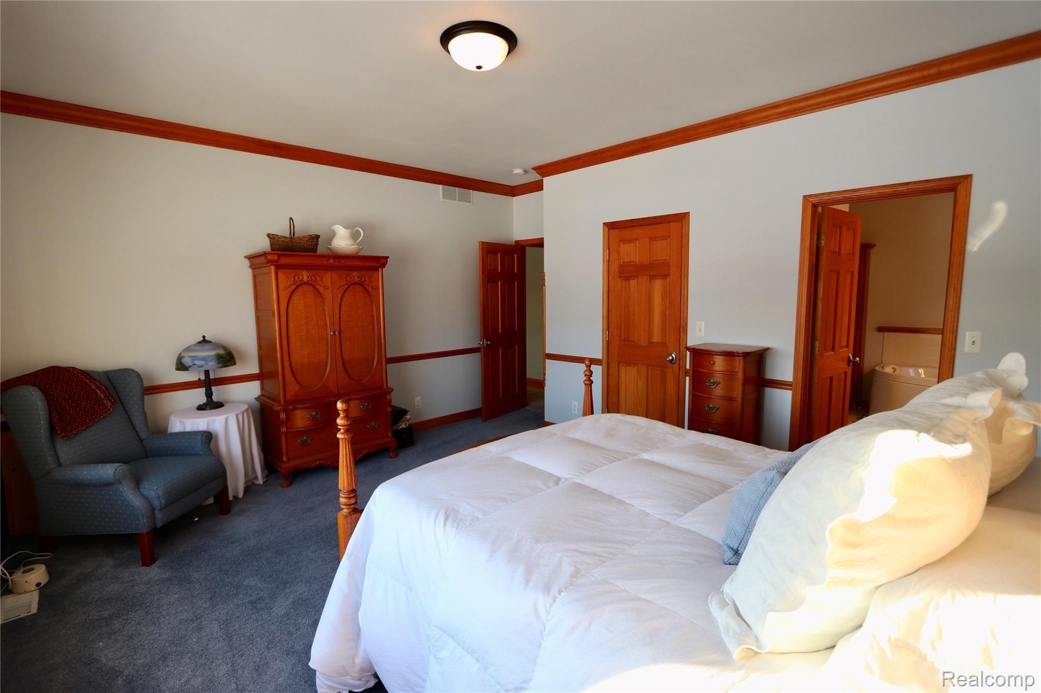 7751 Munsell Road Howell, MI 48843 - Photo 33 of 60 Large Master Bedroom.