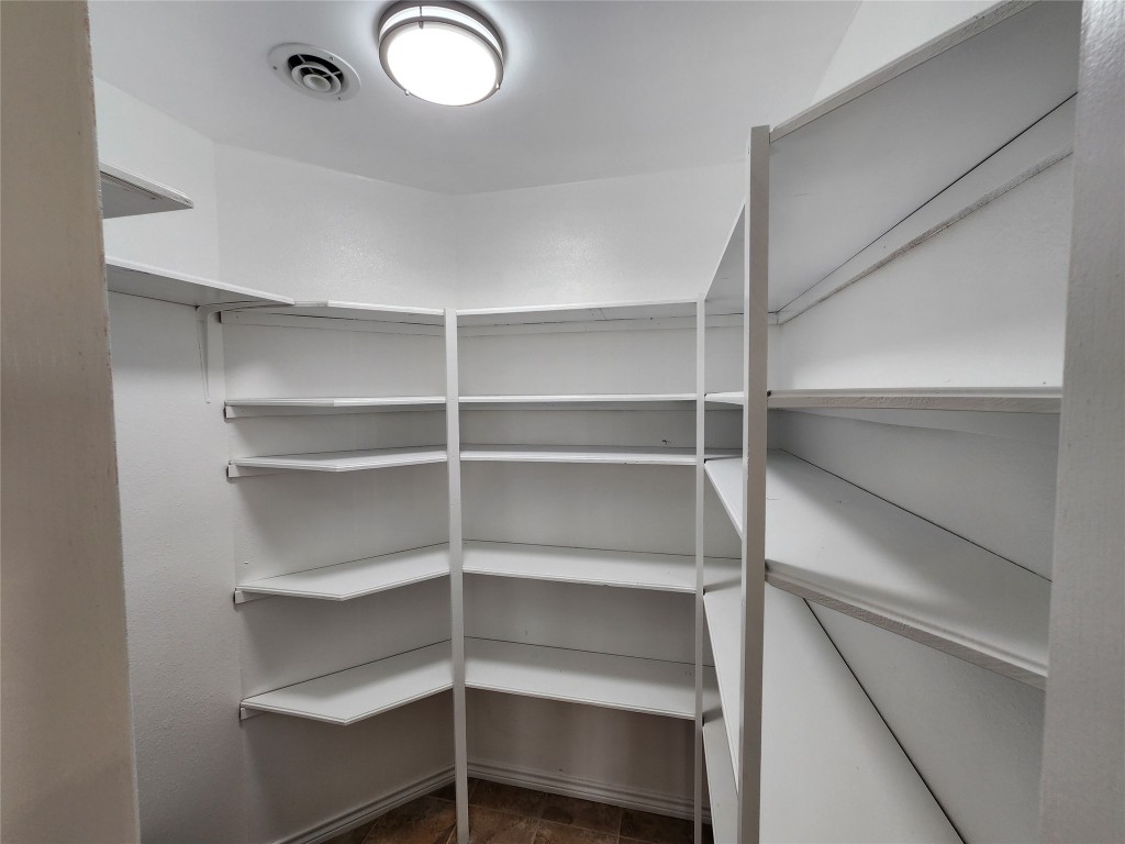 482 West Cattle Drive Onalaska, TX 77360 - Photo 16 of 34 a view of walk in closet with empty racks