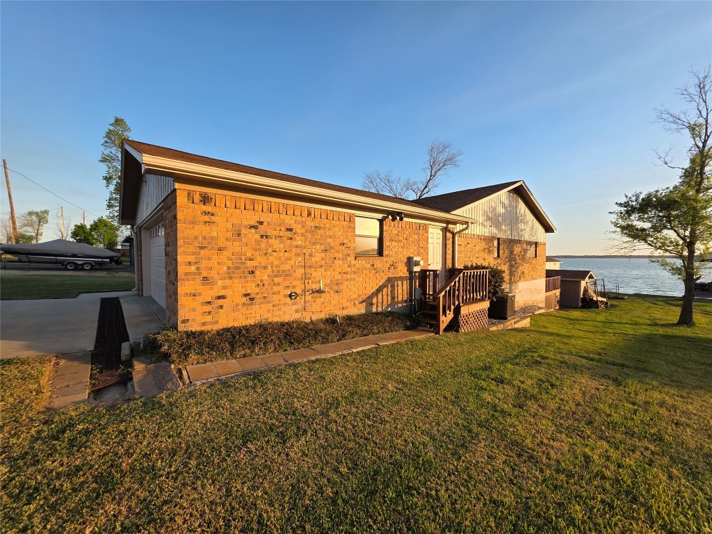 482 West Cattle Drive Onalaska, TX 77360 - Photo 2 of 34 a view of a house with backyard