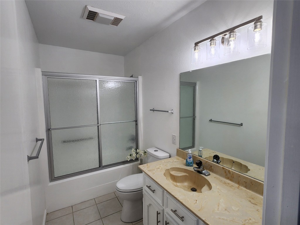 482 West Cattle Drive Onalaska, TX 77360 - Photo 25 of 34 a bathroom with a sink toilet and shower