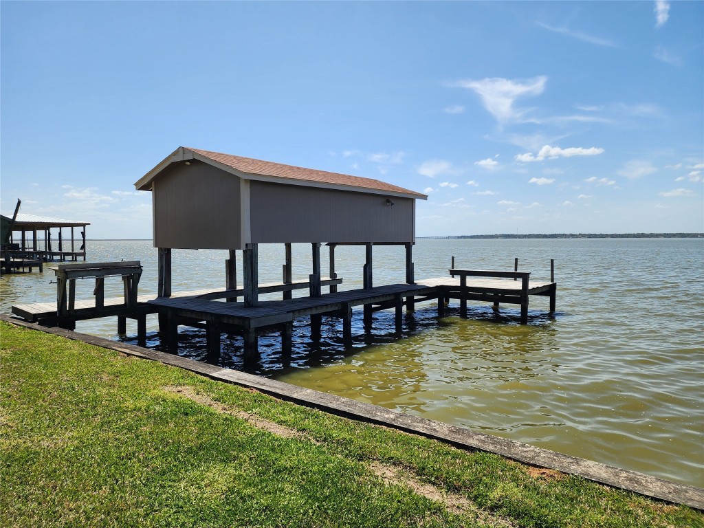 482 West Cattle Drive Onalaska, TX 77360 - Photo 26 of 34 a view of a swimming pool with seating space