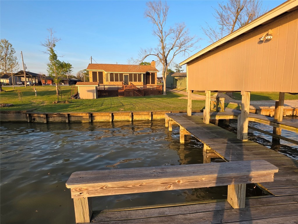 482 West Cattle Drive Onalaska, TX 77360 - Photo 30 of 34 a view of a swimming pool with lawn chairs