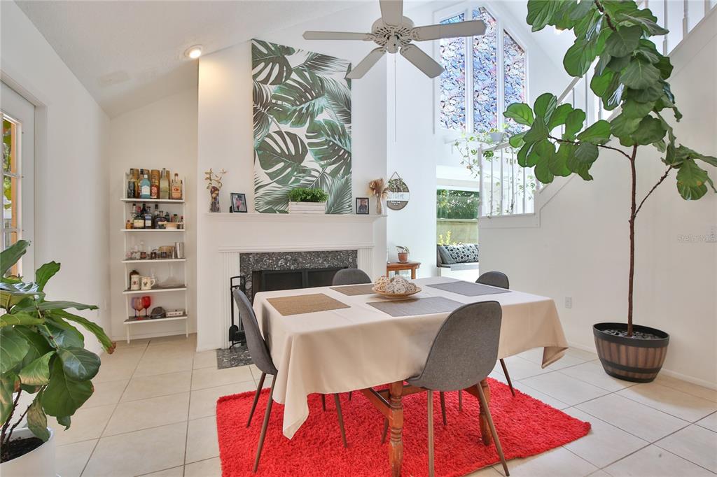7303 Manatee Street Sarasota, FL 34243 - Photo 12 of 39 a living room with furniture and a potted plant