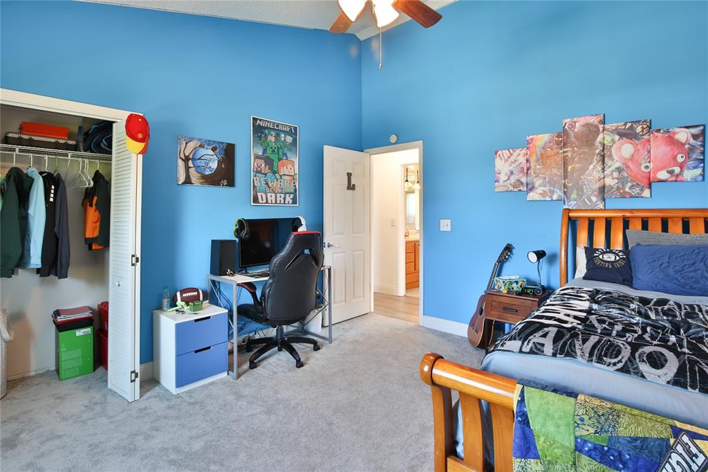 7303 Manatee Street Sarasota, FL 34243 - Photo 30 of 39 a bedroom with furniture and a window