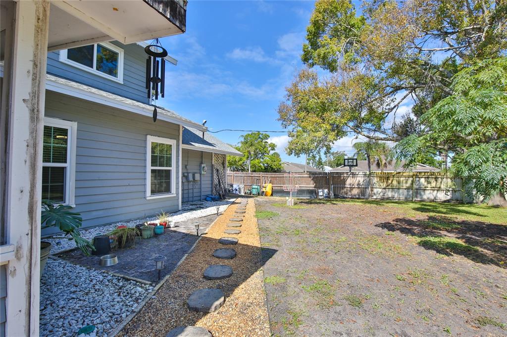 7303 Manatee Street Sarasota, FL 34243 - Photo 39 of 39 a view of a backyard with swimming pool