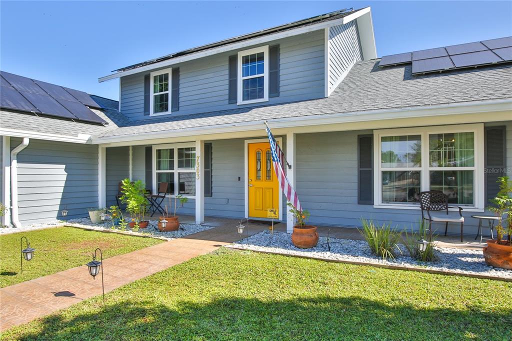 7303 Manatee Street Sarasota, FL 34243 - Photo 5 of 39 a view of a house with a patio