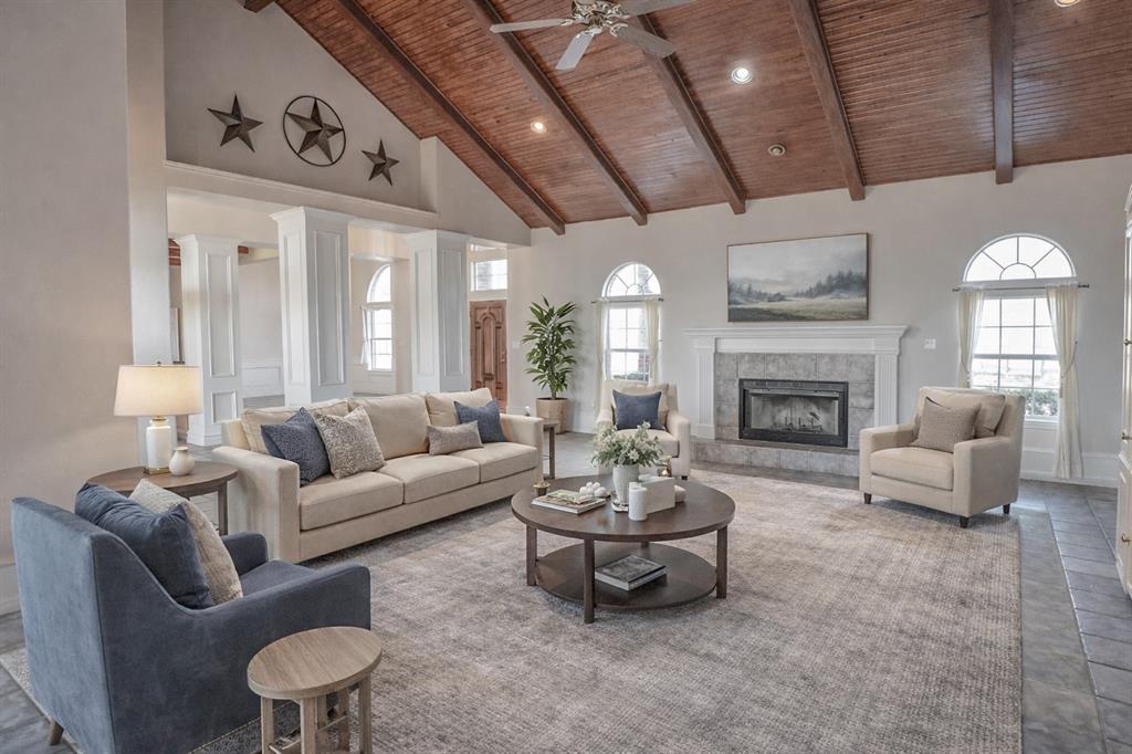1041 Clarence Road Temple, TX 76501 - Photo 11 of 36 a living room with furniture and a fireplace