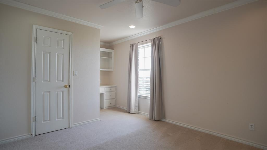 1041 Clarence Road Temple, TX 76501 - Photo 19 of 36 an empty room with closet and a window