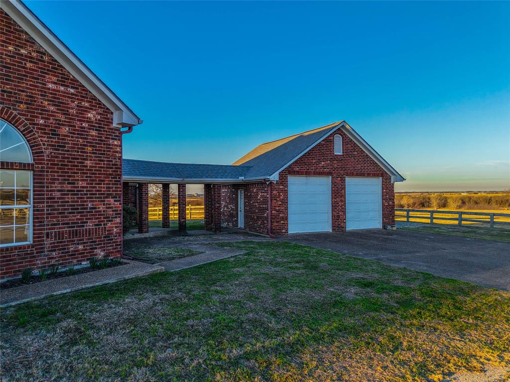 1041 Clarence Road Temple, TX 76501 - Photo 29 of 36 a front view of a house with a yard