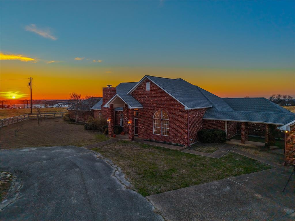 1041 Clarence Road Temple, TX 76501 - Photo 33 of 36 a view of a big house with a big yard and large trees