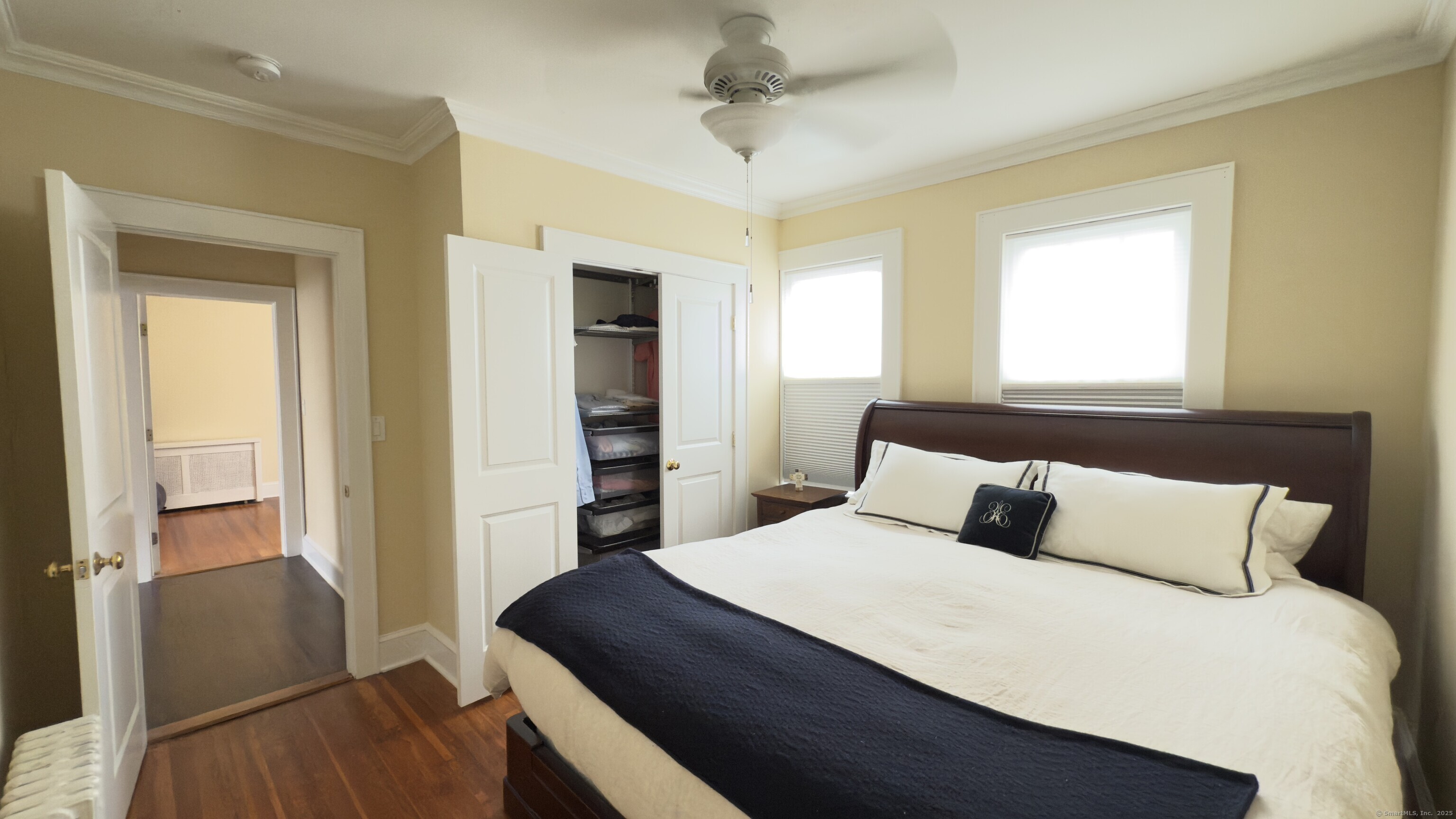 450 Davidson Street Bridgeport, CT 06605 - Photo 16 of 16 a bedroom with a bed and a dresser
