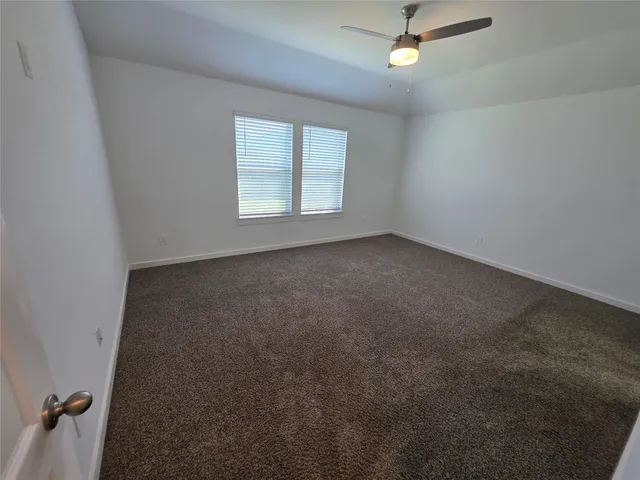 a bathroom with a double vanity sink and mirror