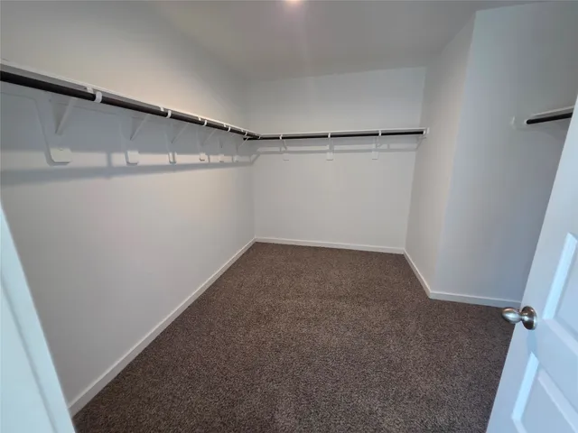 a bathroom with a tub and a sink