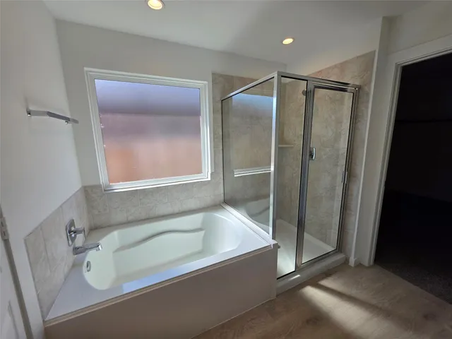 a bathroom with a sink a toilet and tub