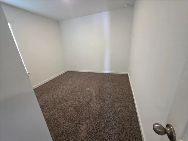 an empty room with a workbench