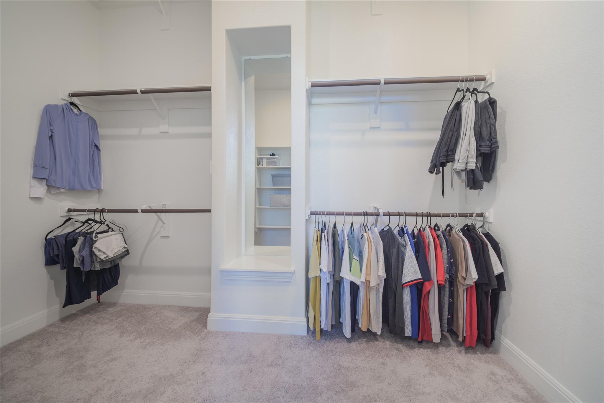 3049 Sage Ranch Drive Leander, TX 78641 - Photo 14 of 23 Ample hanging space and shelving create an organized wardrobe experience.