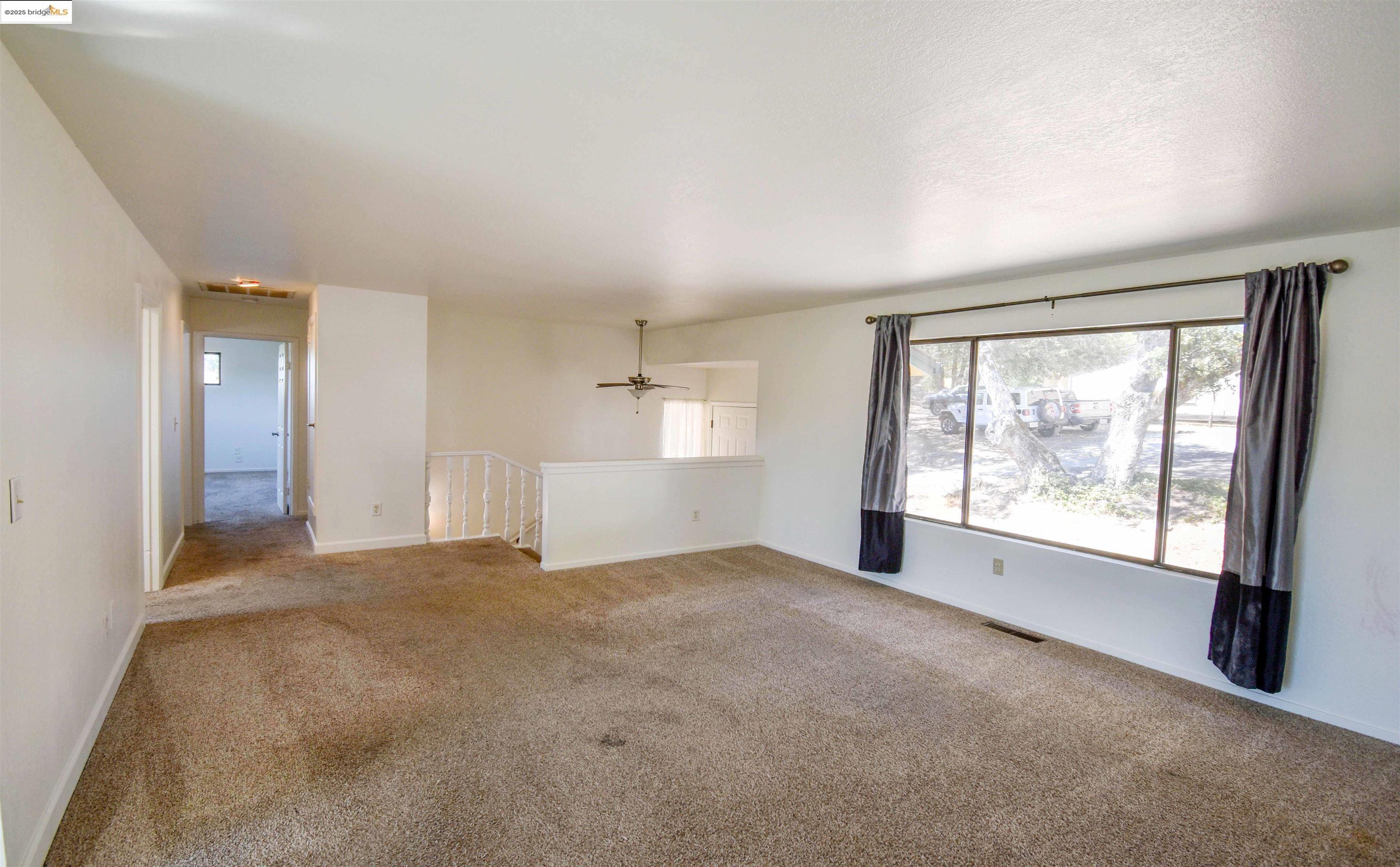21850 Phoenix Lake Road Sonora, CA 95370 - Photo 13 of 39 a view of empty room with front door
