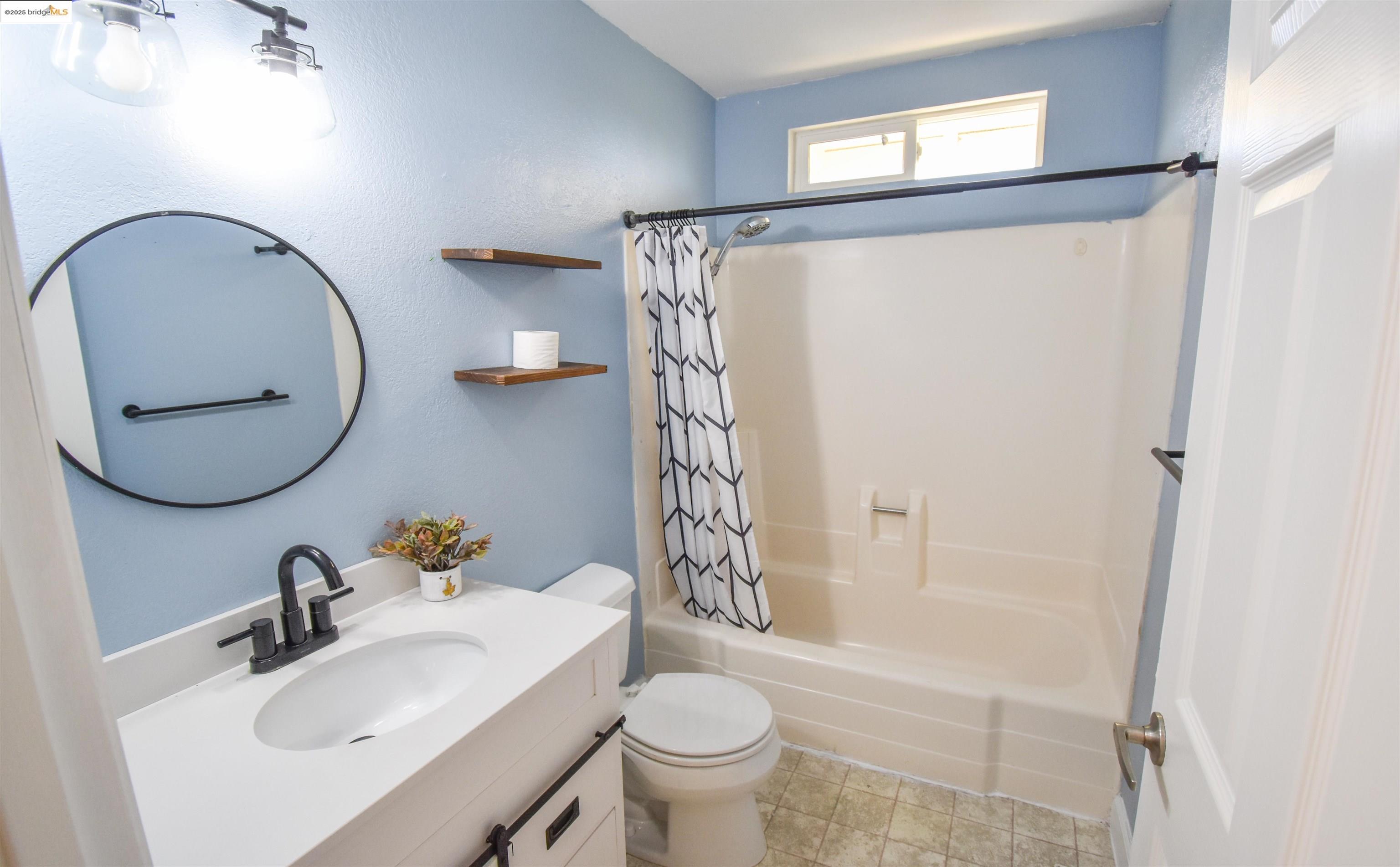 21850 Phoenix Lake Road Sonora, CA 95370 - Photo 23 of 39 a bathroom with a sink toilet and shower